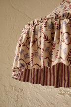 Daunder Ruffle Statement Lampshade in Merlot & Dusty Blue, showing the hand-painted botanical print and contrasting striped lining