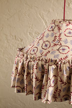 Daunder Ruffle Statement Lampshade in Merlot & Dusty Blue, showing the hand-painted botanical print and frill hem details on the skirt lampshade