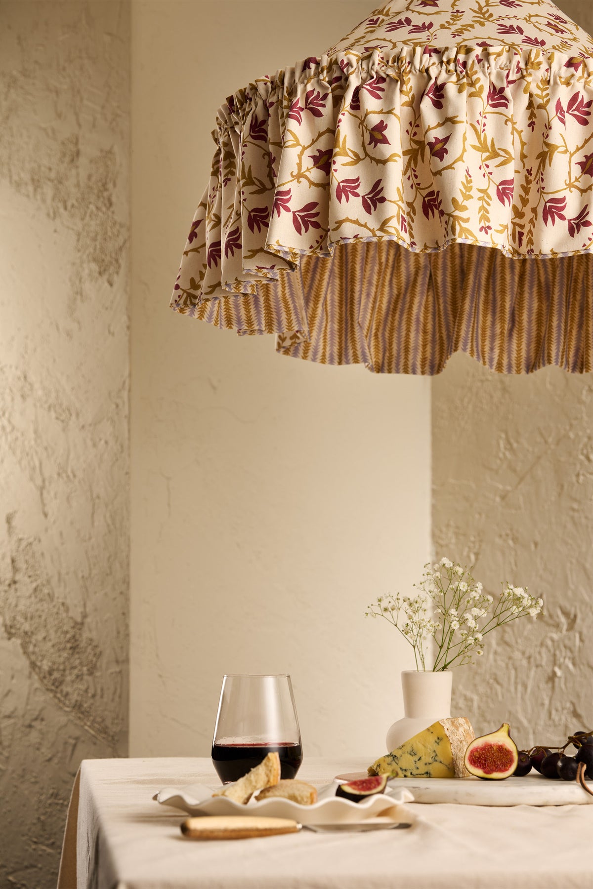 Close-up of Daunder Ruffle Statement Lampshade in Ochre & Merlot showing the gathered ruffle and contrasting striped lining