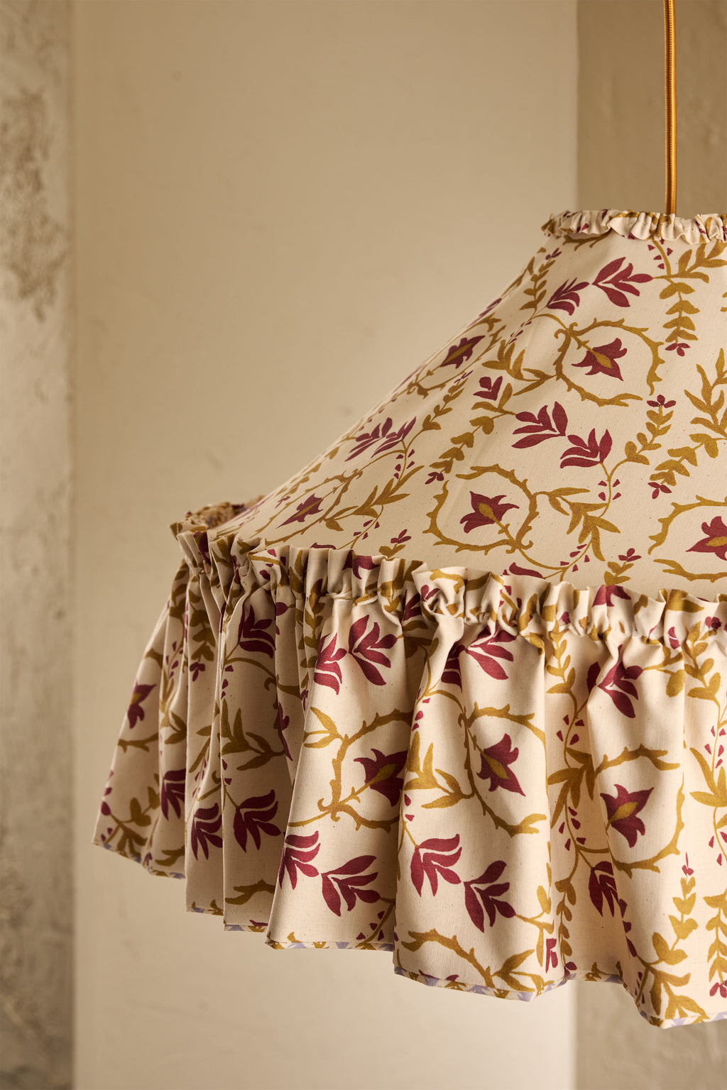 Close-up of Daunder Ruffle Statement Lampshade in Ochre & Merlot showing the gathered ruffle edging 