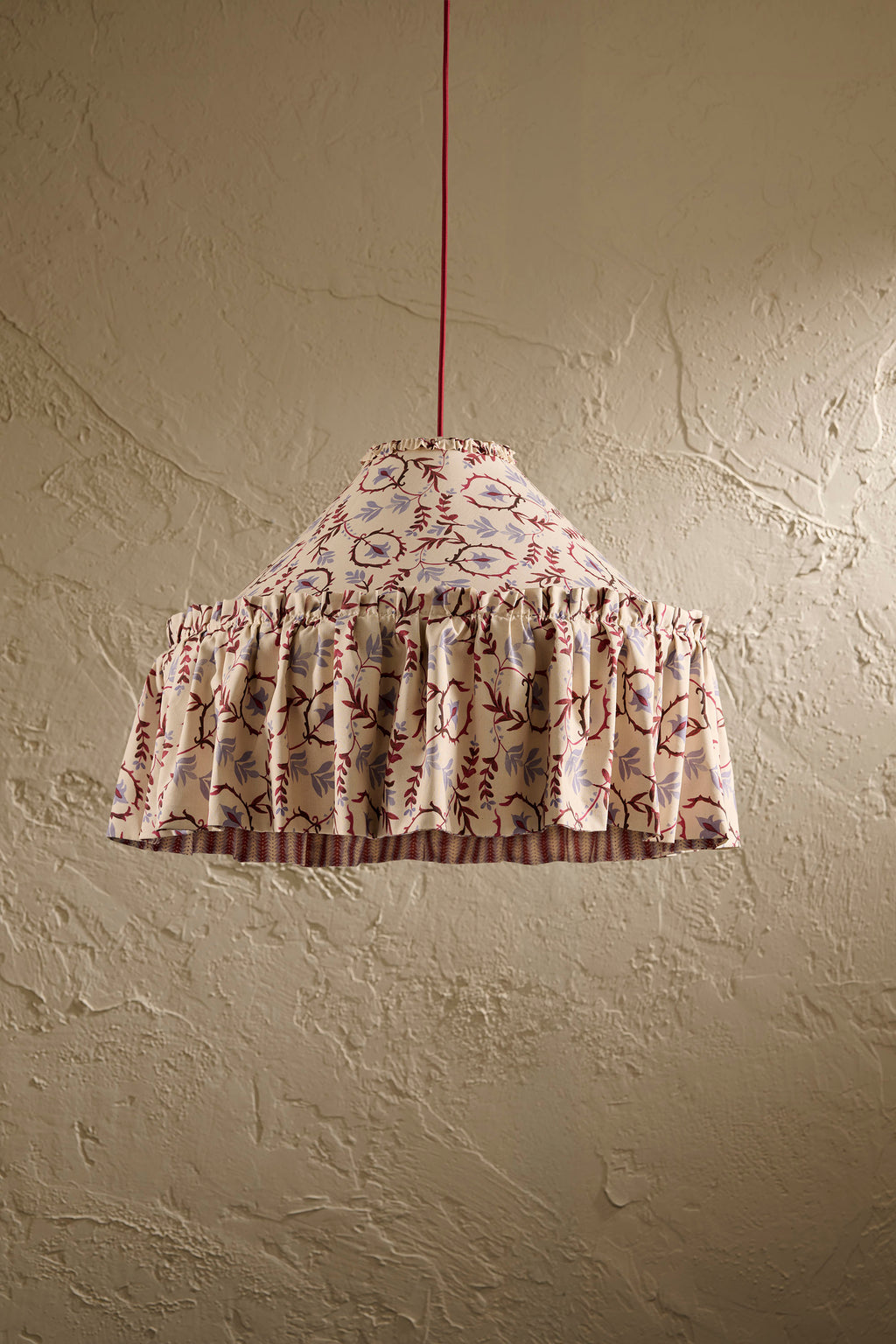 Daunder Ruffle Statement Lampshade in Merlot & Dusty Blue, showing the hand-painted botanical print and contrasting striped lining