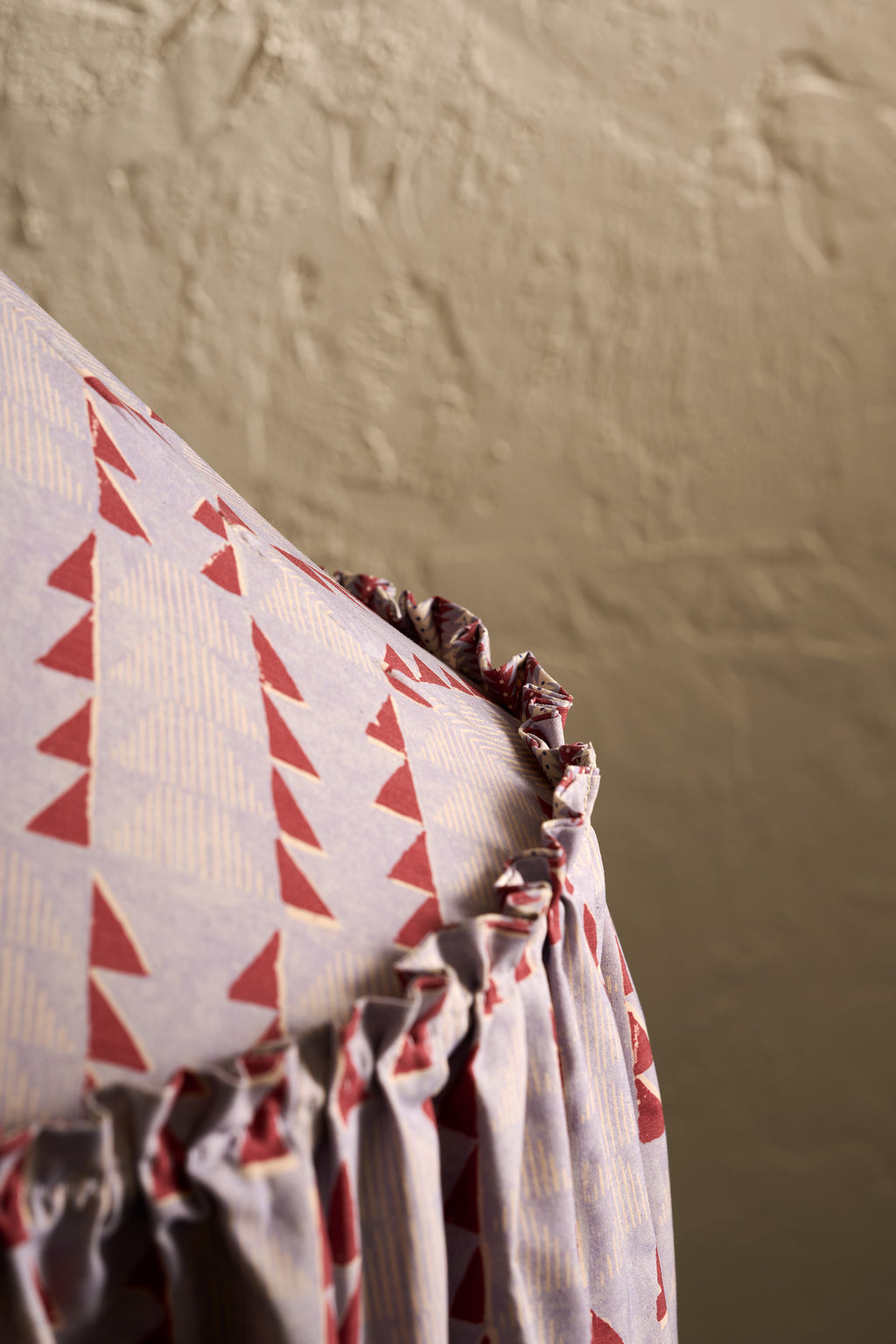 Close-up of Ellis Ruffle Statement Lampshade in Dusty Blue & Merlot showing the gathered ruffle edge deatil with contrasting geometric lining