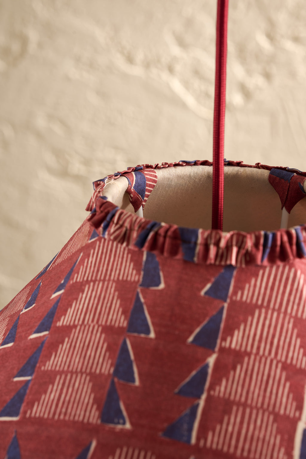 Close-up of Ellis Ruffle Statement Lampshade in Merlot showing the gathered ruffle edge detail on the top of lampshade