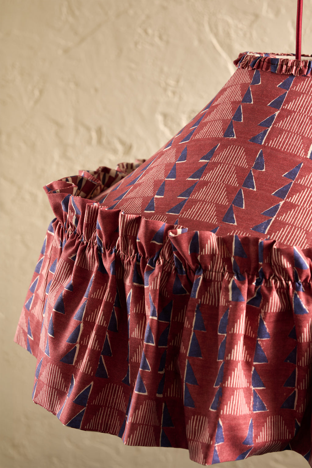 Close-up of Ellis Ruffle Statement Lampshade in Merlot showing the gathered ruffle hem detail