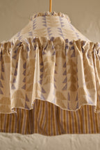 Close up detail of Ellis Ruffle Statement Lampshade in Dusty Sky & Ochre showing the ruffle trim and contrasting geometric lining
